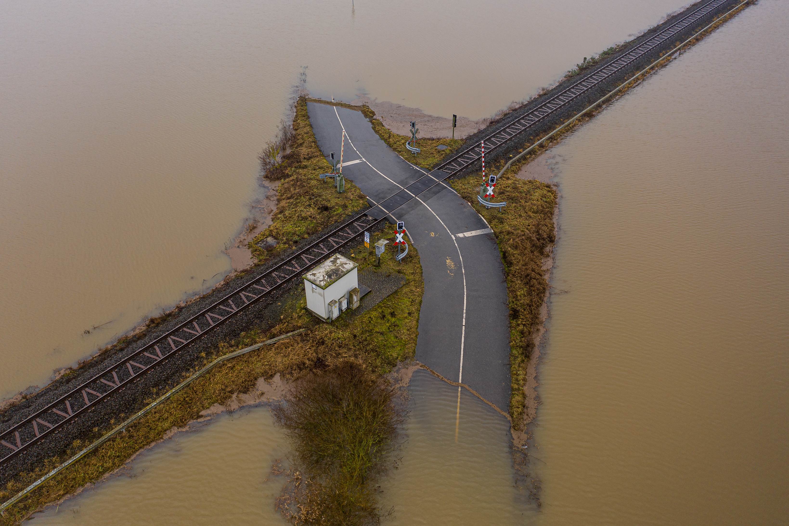 Flooded road passing over the railway in Germany