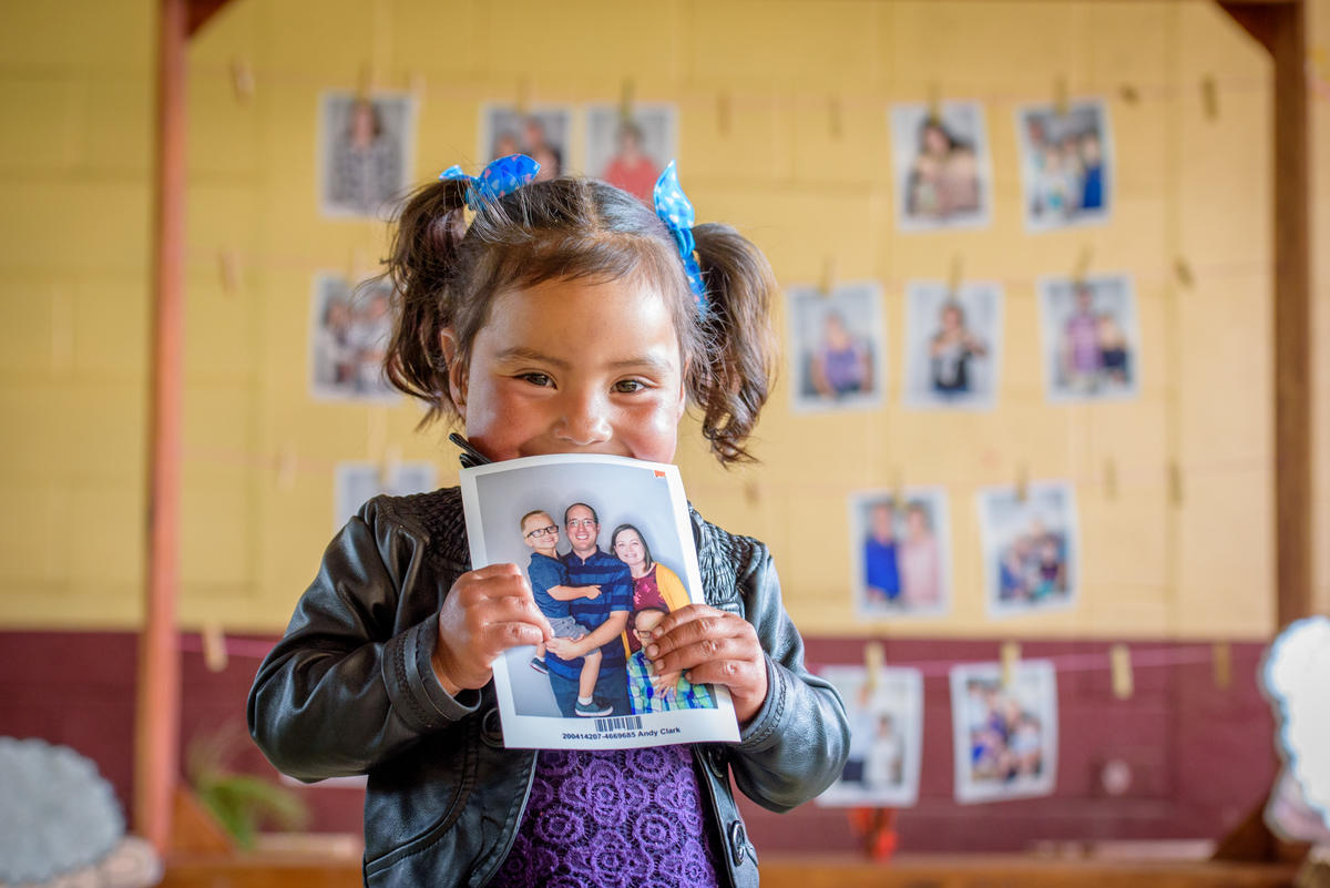 Greisy and a photo of her chosen sponsor