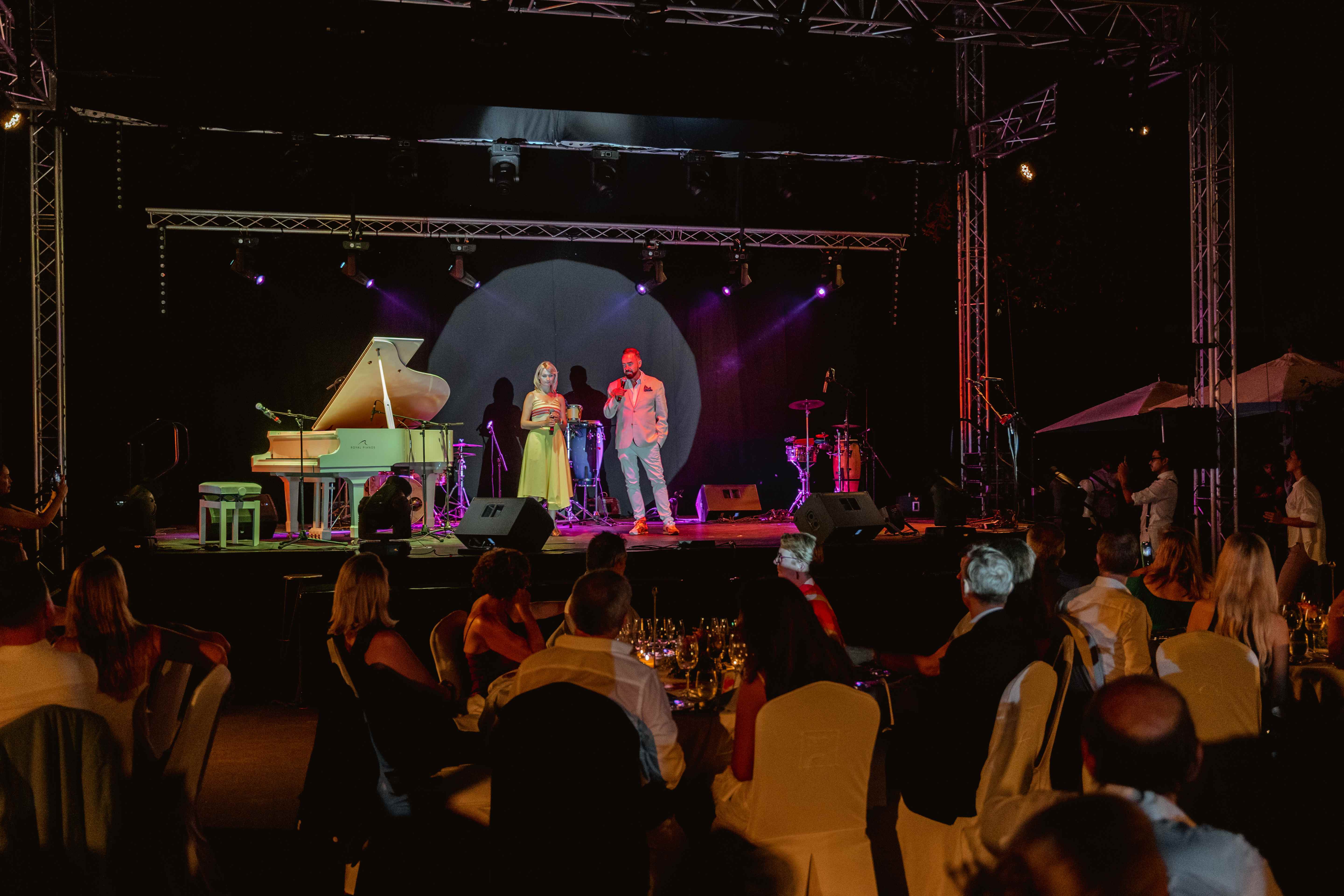 Stage Spotlight of the MC at the 2022 World Vision Gala