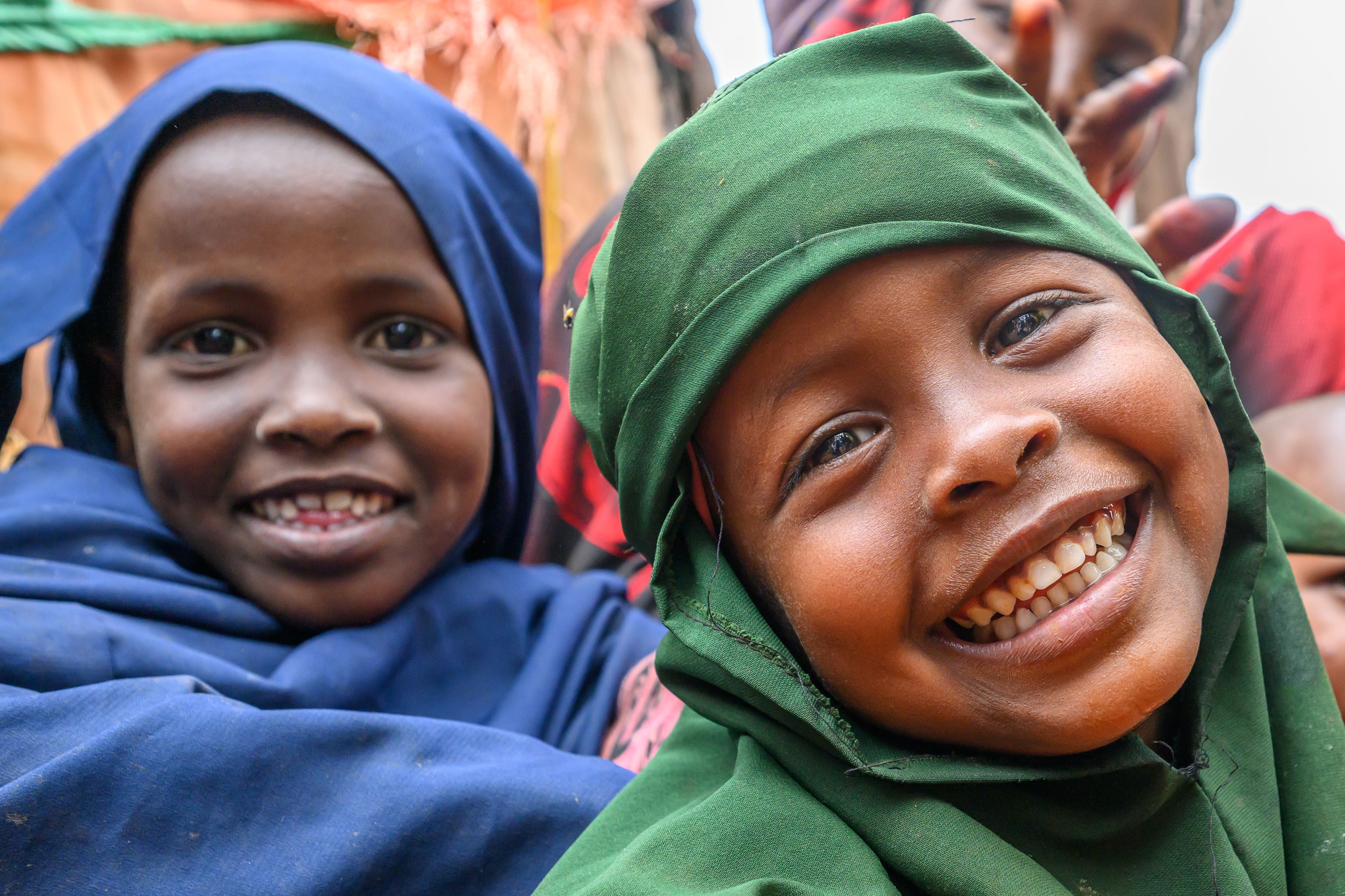Two girls smiling