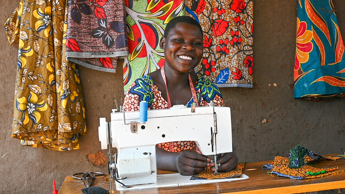 Ruth at her tailoring business, Uganda