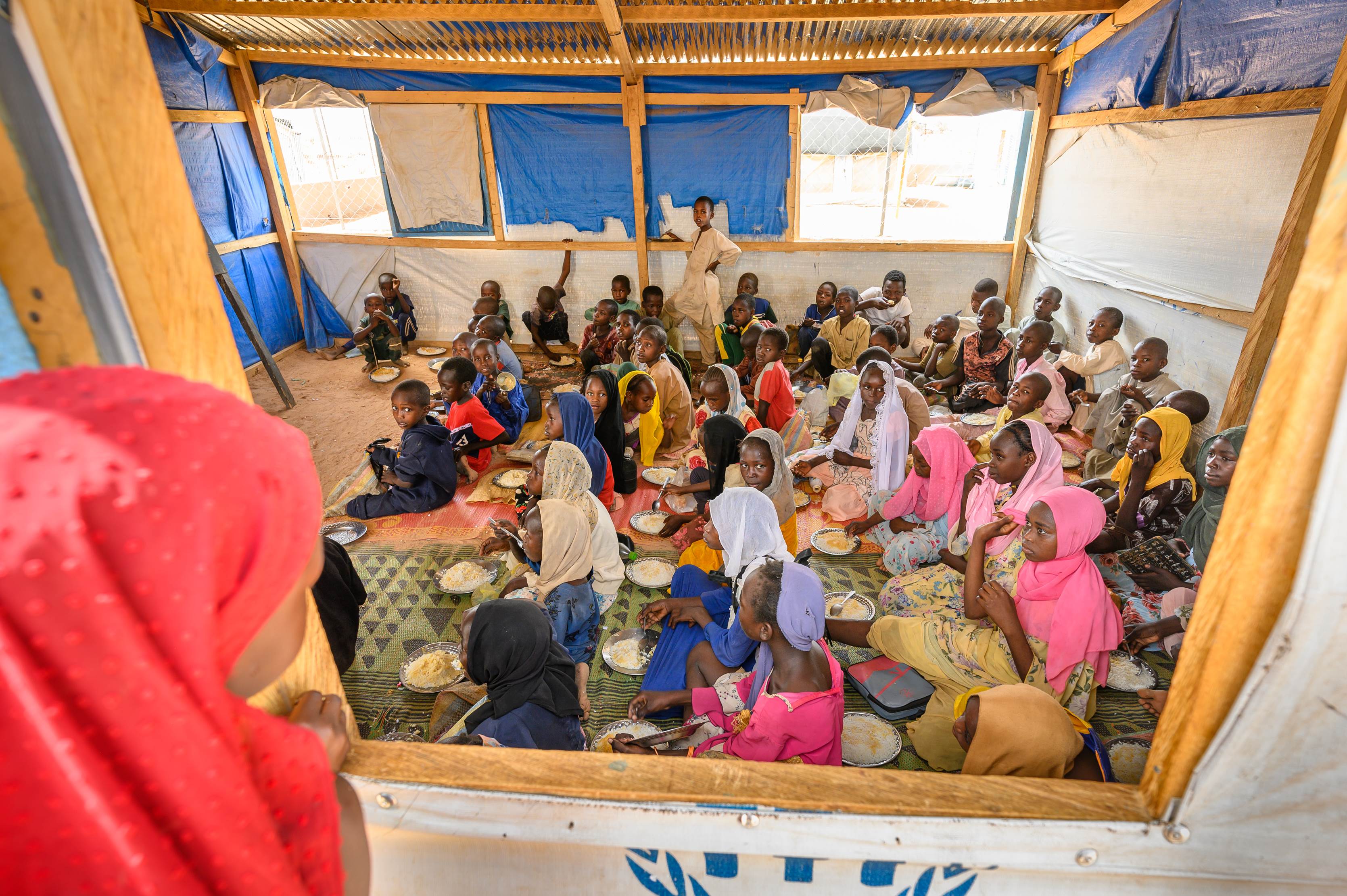 Hungry children at a nutrition programme