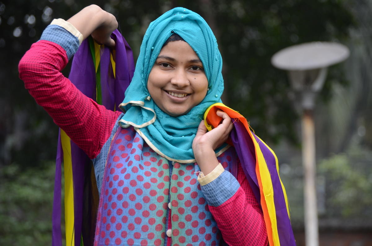 Girl smiling and wearing a Hijab in Bangladesh