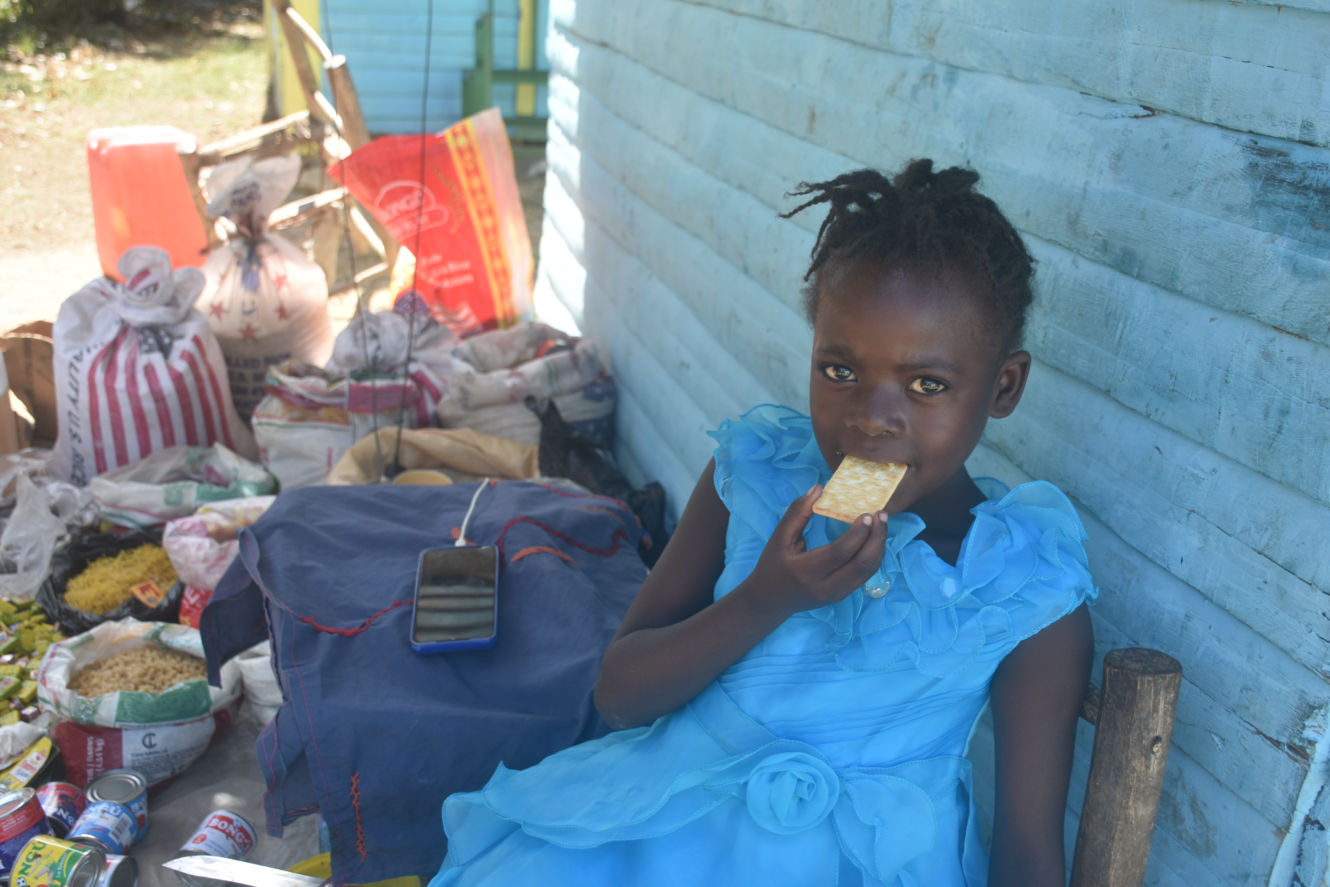 A child in Haiti eating food