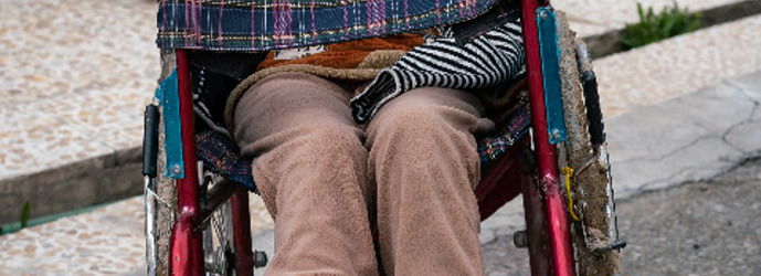 Girl sitting in the wheel chair