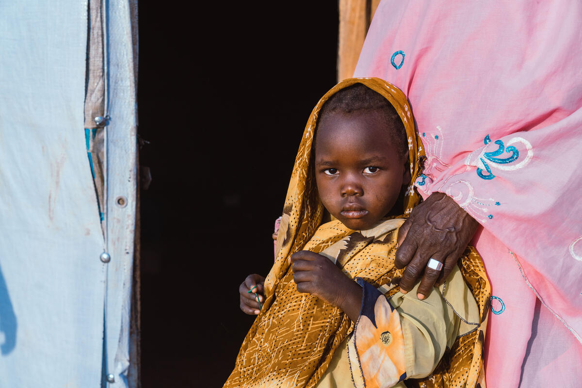 Young girl from Chad lives in a refugee camp with her grandmother