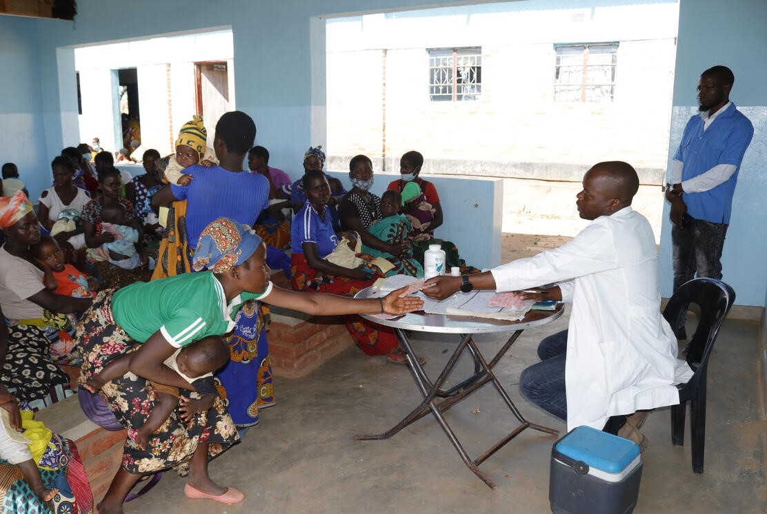 Mothers with their children, attending the under-fives clinic at the new health centre.